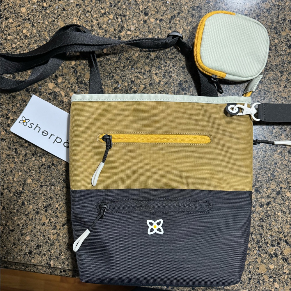 NWT Sherpani Sadie Crossbody bag in walnut